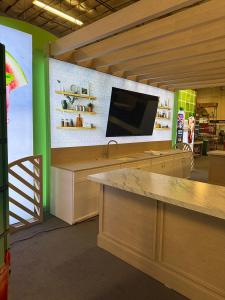 Custom Island Exhibit with Backlit and Non-Backlit Fabric Graphics -- View 9